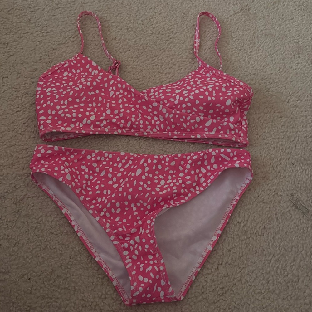 Pink polka dot bikini top and bottom set